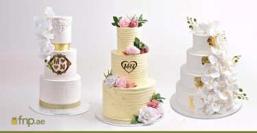 2 Tier Wedding cake placed on table