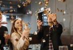 Group of friends enjoying New Year's Eve party with joy and excitement
