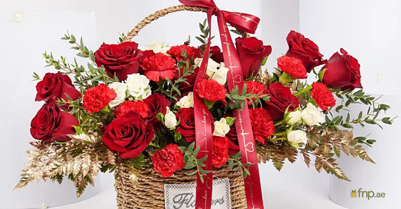 A beautiful Bouquet of Red Roses and other red flower
