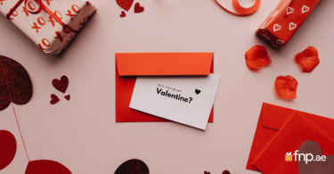 red color Will you be my Valentine card on desk
