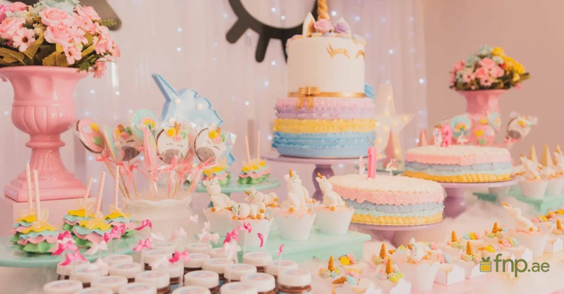 Cakes and Cupcakes on decorated table