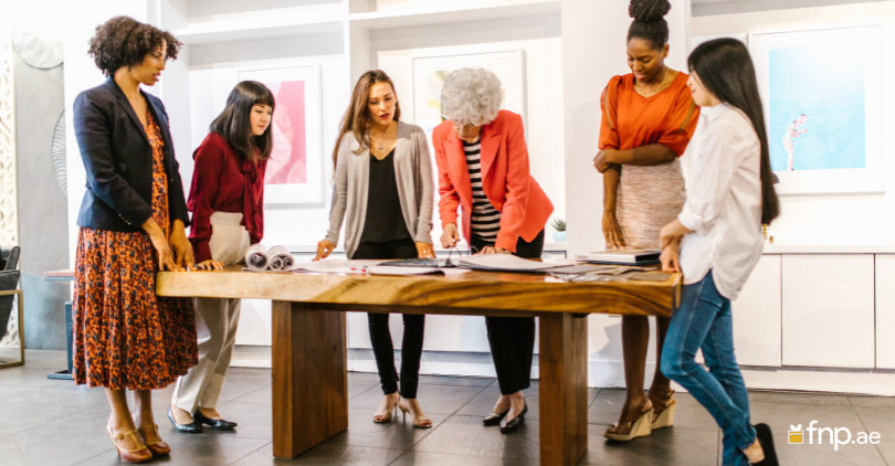 A group of professional women having conversation