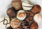 Different types of belgian chocolates kept on table