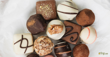 Different types of belgian chocolates kept on table