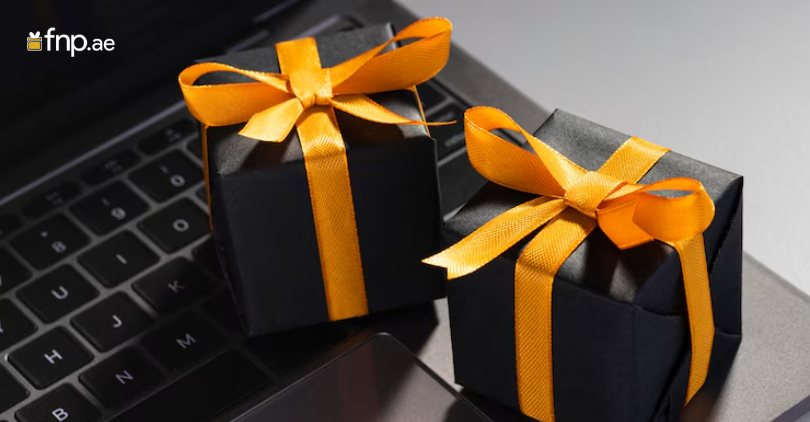 Corporate gift boxes kept on laptop