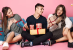 Happy Gen Z Kids unwrapping their gifts