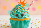 A blue cupcakes with smile choco face