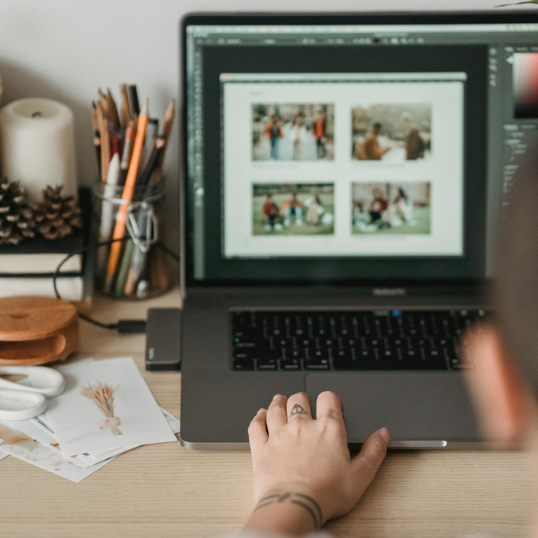 A person creating photo albums online