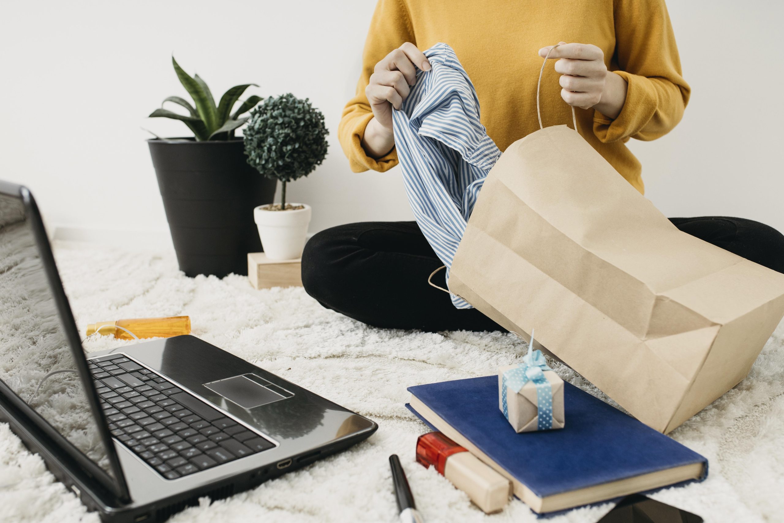 A Women Doing Online shopping with her brother via video call