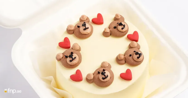 Bento cake with cute bear and heart design on it