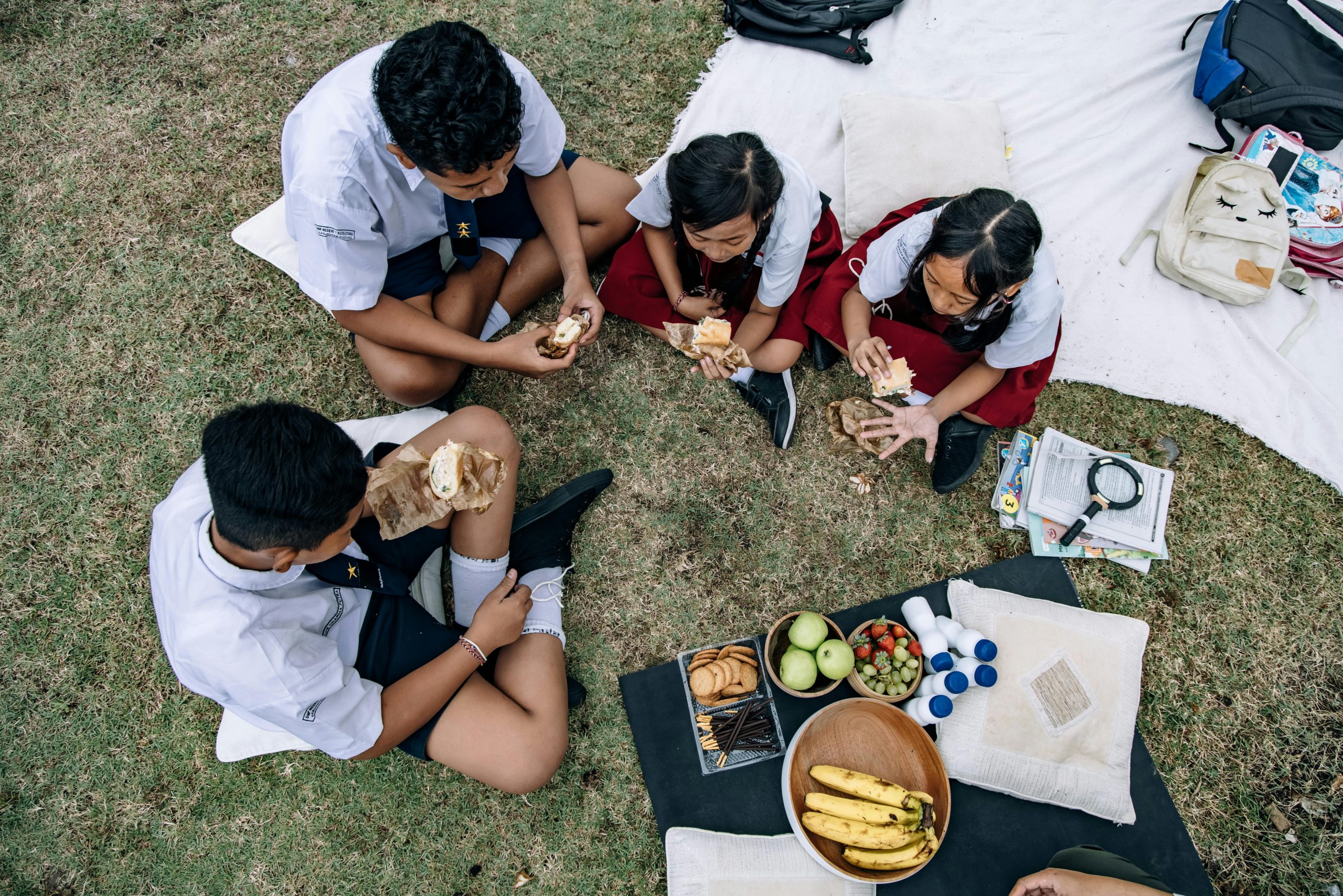 Student and Teacher enjoying outdoor picnic
