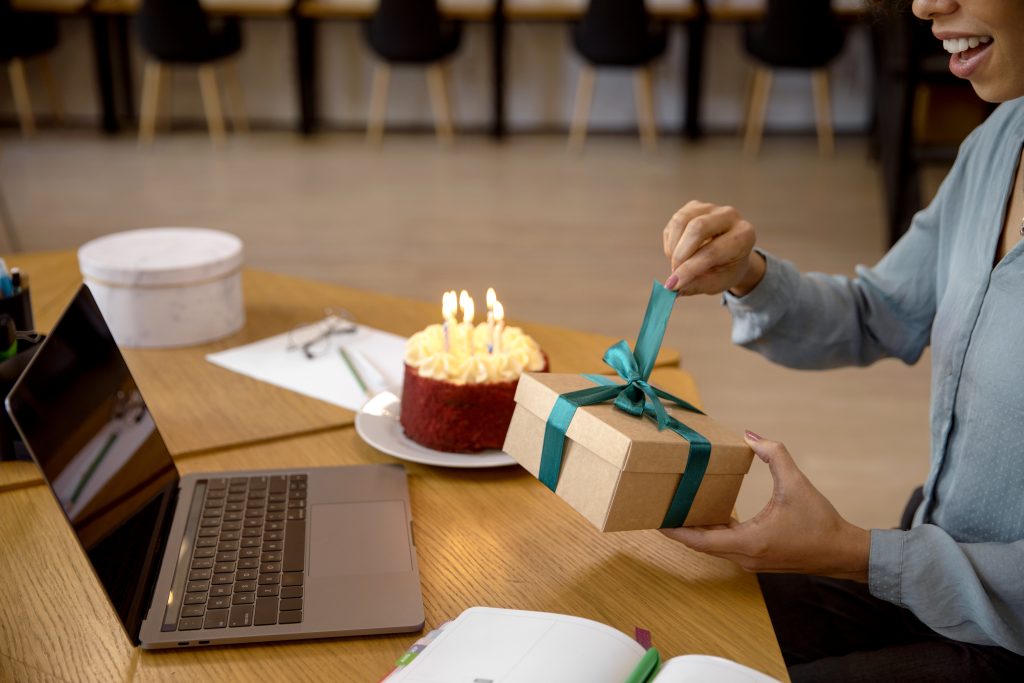 Cake and gift on table