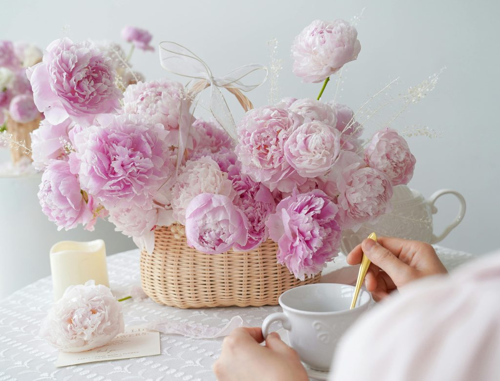 Pink flowers in Beautiful Wooden basket