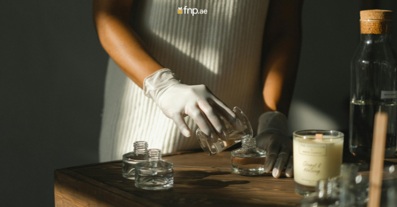 Person making and blending perfume