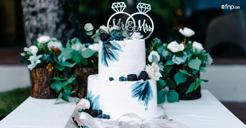 White wedding cake with Beautiful Topper