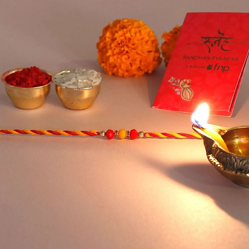 Mauli Harmony Rakhi And 16 Pcs Ferrero Rocher: Rakhi to Al Ain