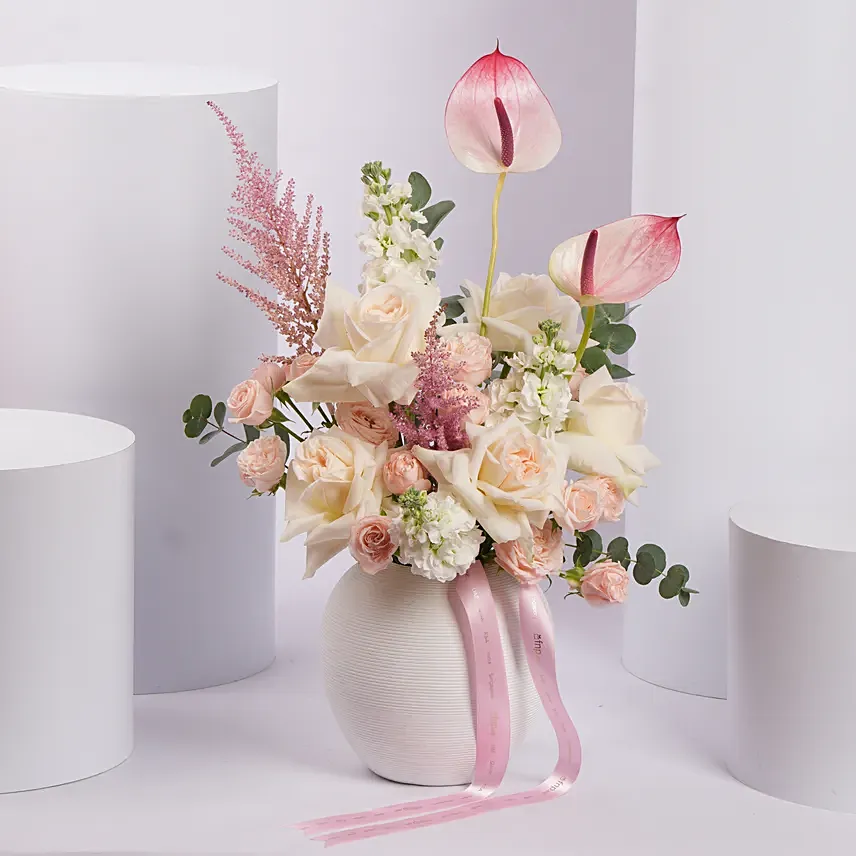 Pink and White Flower Arrangement in White Ceramic Vase: Premium Flowers