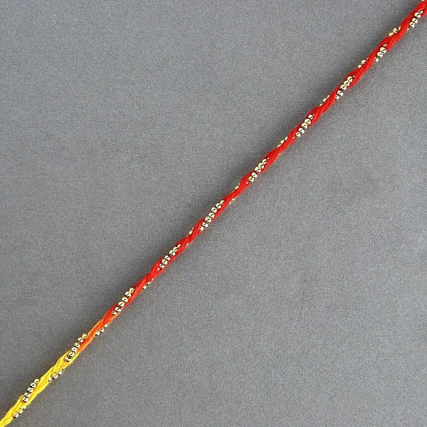 Sacred Bead Work Mauli Rakhi And 16 Pcs Ferrero Rocher: 