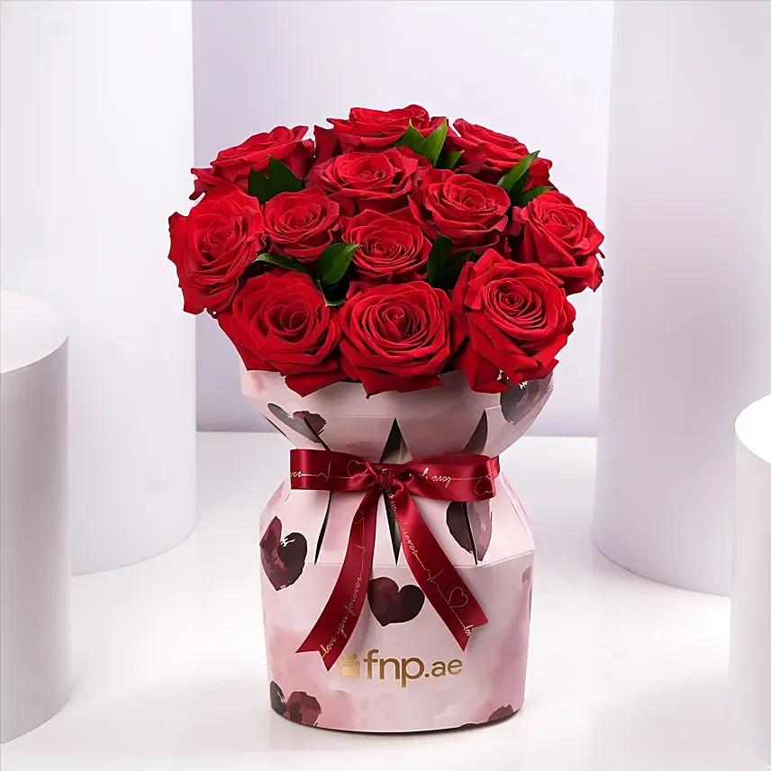 Valentine 12 Pure Romance Roses: Valentines Day Flowers to Ajman