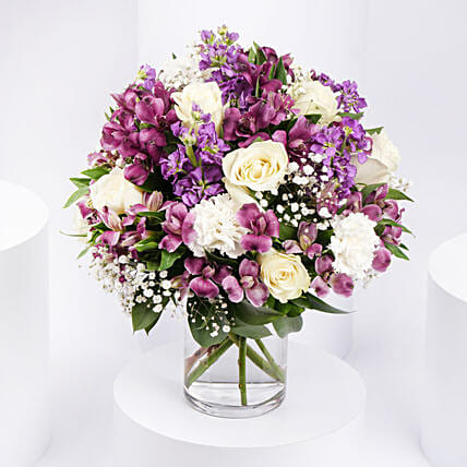 Purple and White Floral Bunch In Glass Vase: Flowers