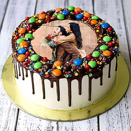 Chocolate Drip MNM Photo Cake For Anniversary: أرسل هدايا مخصصة إلى قطر