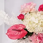 Blushing Blossom Arrangement in Glass Vase