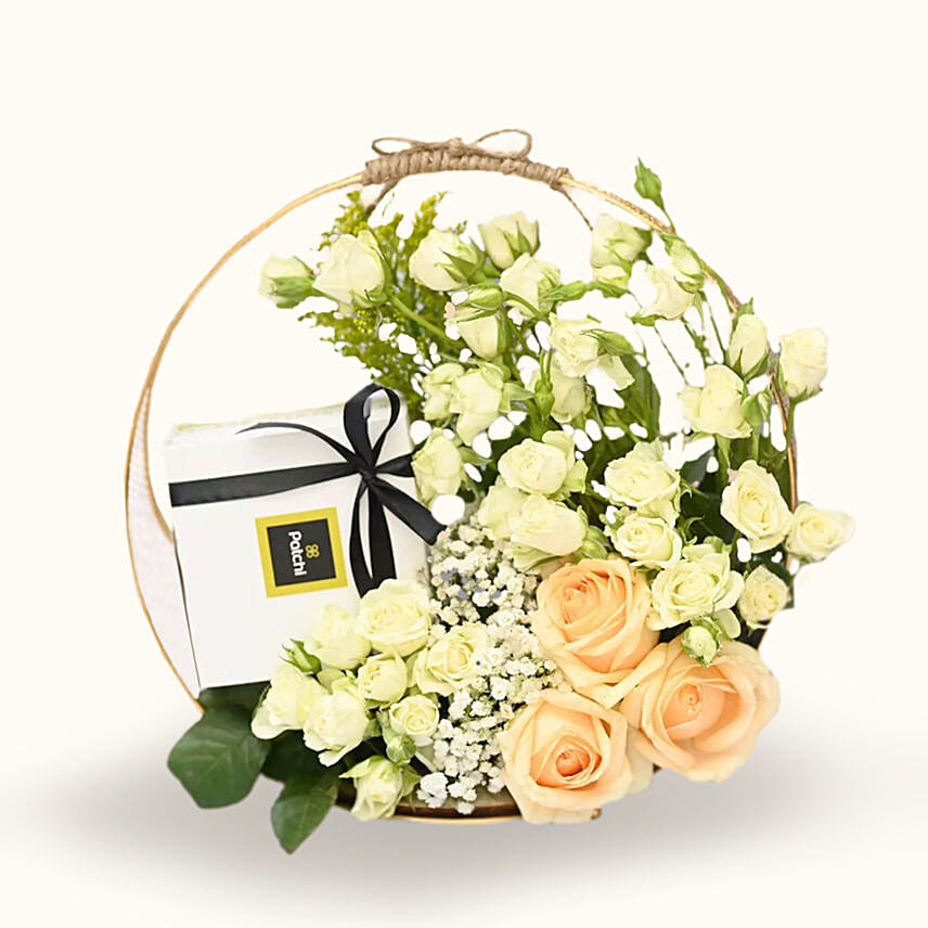 Mixed Roses And Chocolates Circular Frame: Same Day Gifts Delivery to Saudi Arabia