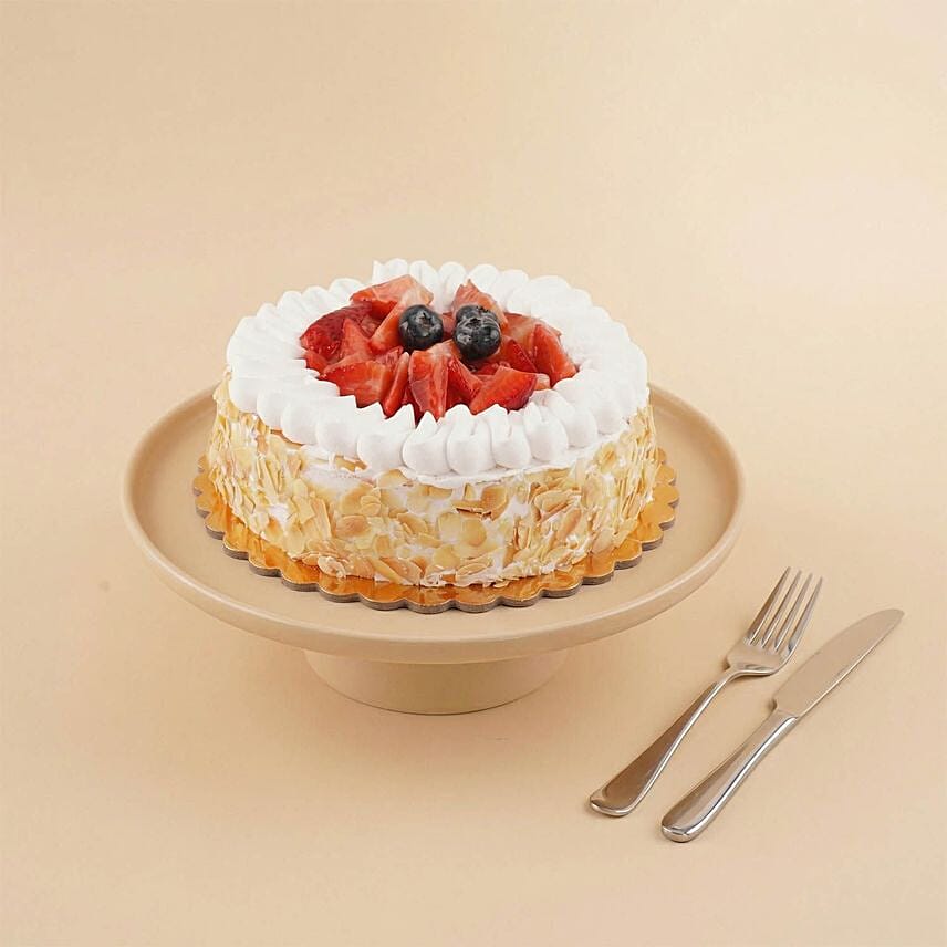 Strawberry Mousse Almond Flakes Cake: Send Ramadan Gifts to Saudi Arabia