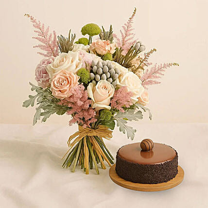 Pastel Petals Flower Bouquet With Chocolate Cake: Send Flowers to Saudi Arabia