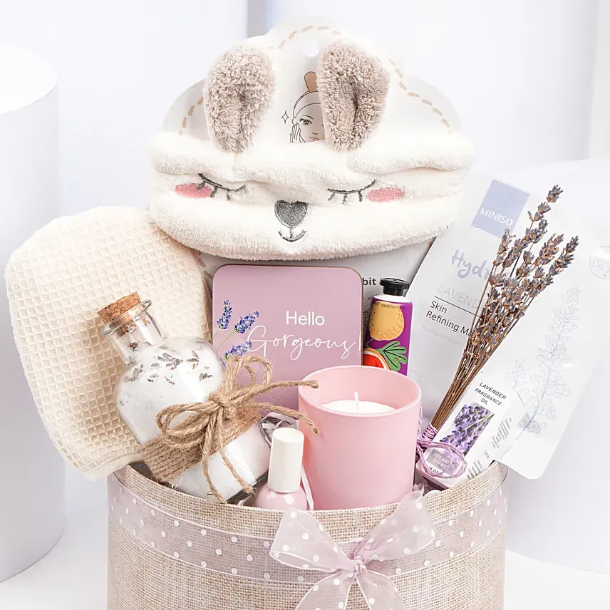 A spa basket filled with premium bath and body products for women